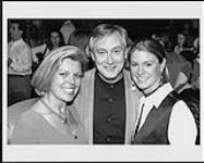 The President of RCA Records, Bob Jamieson, stands with his wife Judy and an unidentified woman [between 1995-2000].