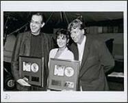 Michelle Wright receives awards for her album "The Reasons Why" 1994.