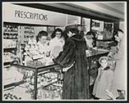 [Pharmacy counter, Regina, Saskatchewan, 1950s] ca. 1950