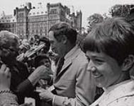 Nancy Greene and Prime Minister P.E. Trudeau signing autographs on Parliament Hill 1968