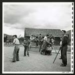 Canadianized Japanese boys play football at the Lemon Creek Settlement [1945/06/16-1945/06/28]