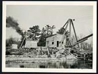 [Wood shanties and materials for the construction of the Champlain Bridge] cira 1924-1928.