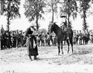 Amusing the crowd (Canadian Corps Horse Show - Reningelst, Belgium). July 19, 1916. July 19, 1916