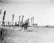 Field Sports (Corps Cavalry Regiment). Slicing the Lemon. Lieut. Robinson  August 1916.