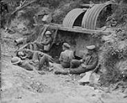 Canadian artillerymen resting after strafing Fritz. July, 1917. July, 1917.