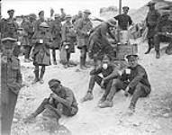 Canadian and Imperial troops helping themselves to free coffee at Canadian Y.M.C.A. Advance East of Arras. Sept. 1918. August 1918.