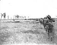 Canadians advancing through a German barrage. Advance East of Arras. September, 1918  September, 1918.