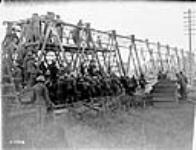 Canadians constructing a bridge across Canal du Nord. Advance East of Arras. September, 1918. September, 1918.
