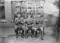 Brig.-Gen. Stewart & Staff, 3rd Canadian Divisional Artillery. November, 1918. Rear(l-r); ?, Bruce Chown, Preston. Front(l-r): Major J.M. MacDowell, Brig. Gen. J.S. Stewart, Kelly  Nov., 1918
