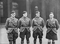 Left to right: Capt. H.S. Hansen, D.S.O. and Bar, M.C., 43rd Bn., Capt. G. Geddies, M.C., 43rd Bn., Capt. H. Walcott, M.C., 43rd Bn., Lieut. F. Chisholm, M.C., 43rd Bn. 1914-1919