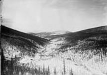 (Canada Alaska Boundary) Looking up Bonanza Valley and up Eldorado Valley to Claim No. 7, 1896 c.a. 1895