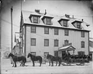 Stage in front of Regina Hotel, Dawson, Y.T. 1898-1910