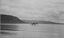 Bellanca 66-70 'Air Cruiser' aircraft CF-AWR of Mackenzie Air Service Ltd. taking off, LaBine Pt., N.W.T., August 1937