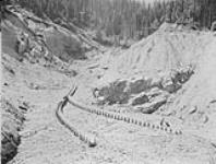 Gravel banks & bed rock - General view of benches & flumes on F. Freiman's claim, Lastchance Creek near Barkerville, B.C 1938