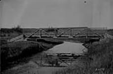 Steel bridge across Vermilion River east boundary section 1, 51-9-4. [2 mi. N. of Mannville, Alta.] 1923
