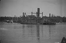 Dredge, Lake Winnipeg - dredging off Launching ways, Victoria Beach, [Man.] 1925
