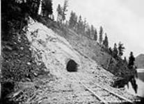 (Construction - Crows Nest Pass Line, Nov. 1897 - Aug. 1898) Moyie tunnel, B.C., Station 1961. 14-6-98.
