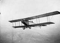 R.F.C. Canada. Testing Curtiss J.N.-4 aircraft in flight over Camp Borden, Ont., 1917. 1914-1919