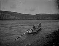 Scows on Athabaska River, Alta., showing steering sweep, 1903 1903