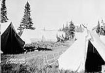 (Relief Projects - No. 51). Indian encampment at Lac Seul Post, Ont., Camp 12. June 1934