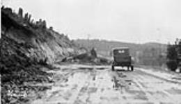 (Relief Projects - No. 57). Slide on the West Coast Road at mile 7. Feb. 1935