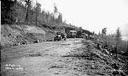 (Relief Projects - No. 63). Shovel and trucks in cut at point 116, looking east. Mar. 1935