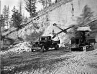 (Relief Projects - No. 154). Shovel in C.P.R. (Canadian Pacific Railway) gravel pit. Dec. 1935