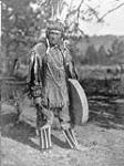 A Klamath man in plains-type costume, [Oregon - California]. 1924