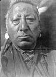 Astanihkyi ("Come-Singing") of the Blood tribe [which lived on the plains along the Belly River, Alberta]. n.d.