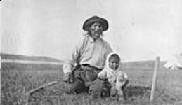An old indian and his grandson, Mattagami, Ont.