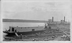 [Right to Left] S.S. "Distributor" S.S. "Mackenzie River" and Barge 300 at Gravel Point, [N.W.T., 1927] 1927