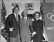 [Robert Paul (left) and Barbara Wagner with unidentified gentleman.] n.d.