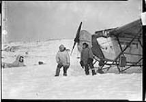 (Hudson Strait Expedition). T.A. Lawrence and G. Black with Fokker 'Universal' aircraft G-CAHI Feb. 1928