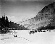 [Fording] up the North Saskatchewan River, looking towards Wilcox Pass, Banff National Park, [Alta.], Oct. 1927