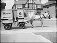 Delivery wagon, Borden's Milk, Avenue Road. 24 July 1947