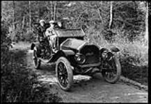 Constable, Edna [Boyd], and F. Hamilton automobiling, 15 Oct., 1910. 15 Oct. 1910