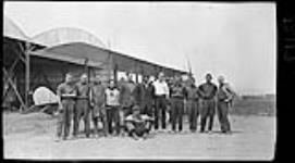 Group of the first ten students [in front of a Curtiss JN-4] at Long Branch. 28 June, 1915