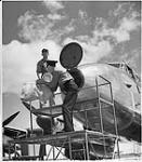 [Loading of trans-Atlantic airmail aboard Avro 'Lancastrian' aircraft of Trans-Canada Air Lines, Dorval, P.Q., c. 1947.]. ca. 1947