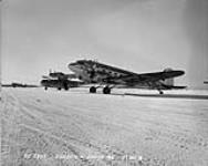 Dakota and Canso aircraft on the ground. 7 Feb. 1951