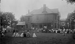 Mrs. Maynard's Tennis party, distant view, July 1895, Stratford, Ont July 1895.