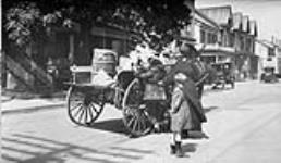 Immigrants on Kensington Avenue, [Toronto, Ontario.]. June 1, 1922
