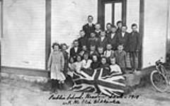 Sichynski School, Meacham, Saskatchewan. Teacher is E. Shklanka. 1919. 1919