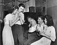 Teenagers drinking coca-cola, 1947. U.E. Philco Strike 1947