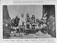 Chief of the Wolf Crest of Git-lak-damaks. Andrew Nash, John Nash, James Percival, Philip Nash, Charlie Brown, Mrs. Eliza Woods, Matilda Peal nee Brown, aunt of the Chiefs 1910