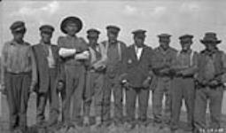 Chief Antoine and other Liidlii Kue First Nation (Dene) men at Fort Simpson, Northwest Territories  [1921]
