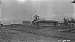 Church of the Russian Mission at Tanana, Alaska, Wireless Station in background. July 1926