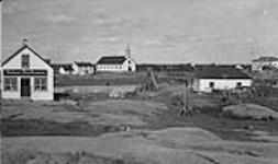 Hudson's Bay Co. store and R.C. Mission Church and hospital Rae. 1943
