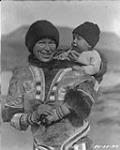 Greenland nursemaid with Danish baby. 1924