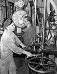 Unidentified engine-room personnel of an unidentified merchant ship, Halifax, Nova Scotia, Canada, 29 November 1942. November 29, 1942.