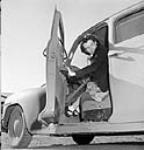Taxi driver Pearl Woollett. Sept. 1943